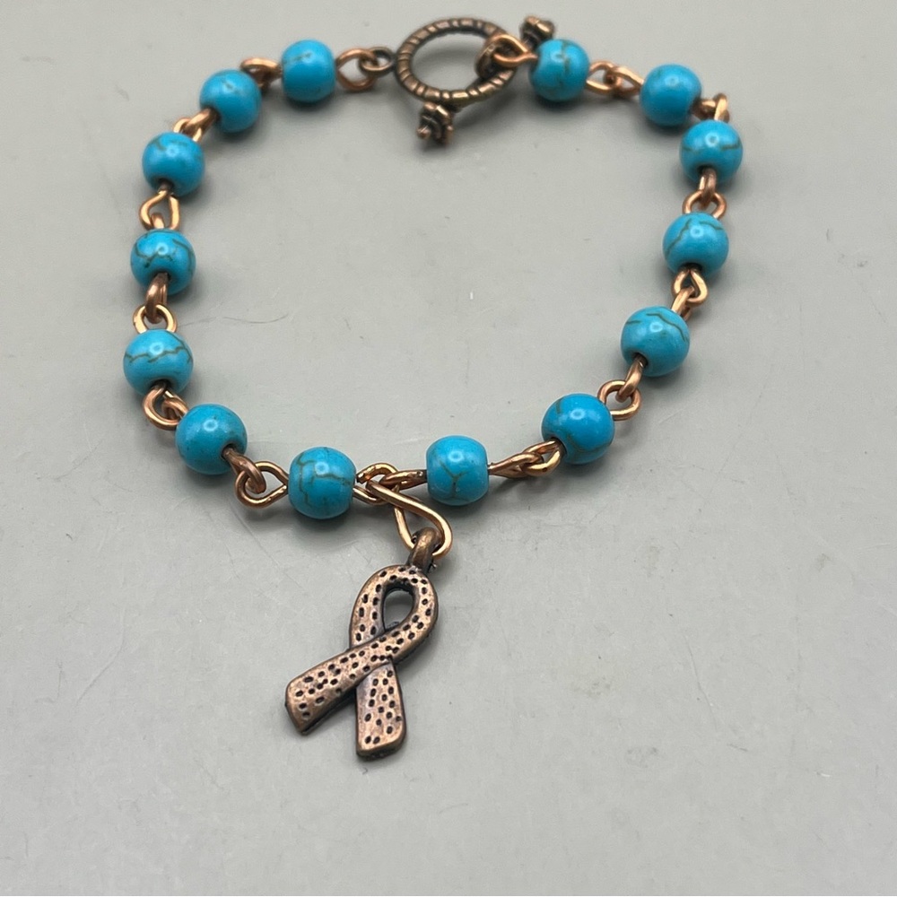 Turquoise Beaded Bracelet with copper Ribbon Charm